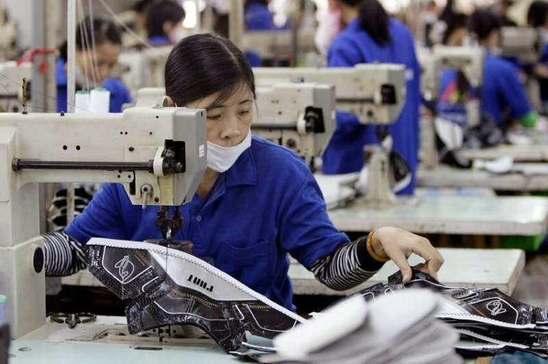 Рабочий фабрики Nike во Вьетнаме получает 0,000024 доллара/сек