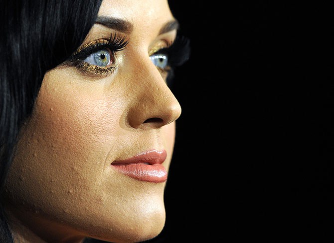 Pop star Katy Perry poses in the press room at the Grammy Nominations Concert, December 1, 2010 at Club Nokia in downtown Los Angeles. The 53rd annual Grammy Awards show will take place in Los Angeles on February 13, 2011. AFP PHOTO GABRIEL BOUYS US - ENTERTAINMENT - GRAMMYS - NOMINATIONS